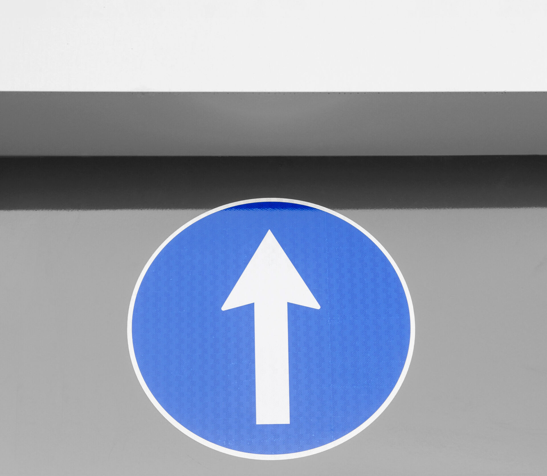 Low Angle Blue Sign With Arrow Copy Space